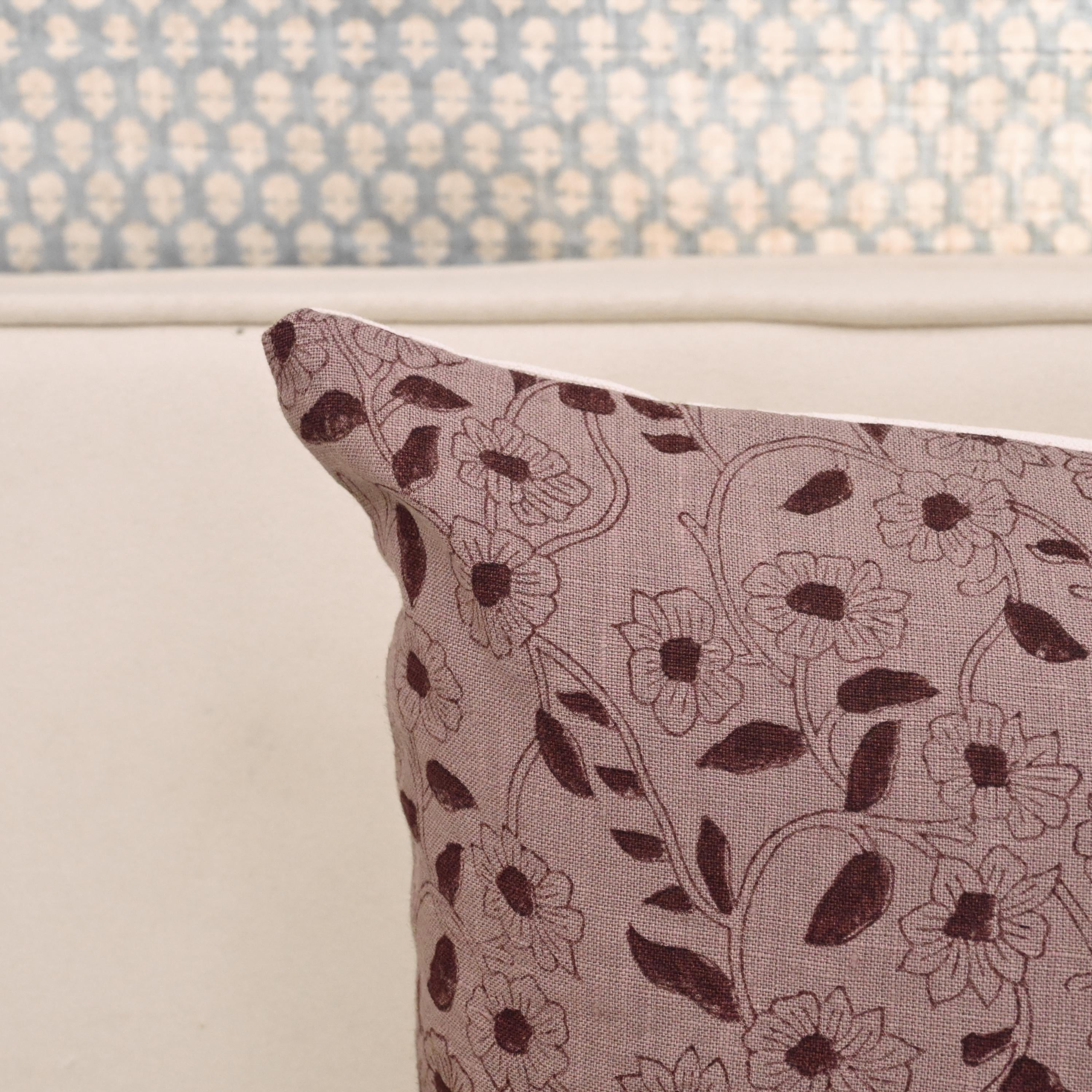 Rustica ditsy daisy linen pillow cover styled on a sofa