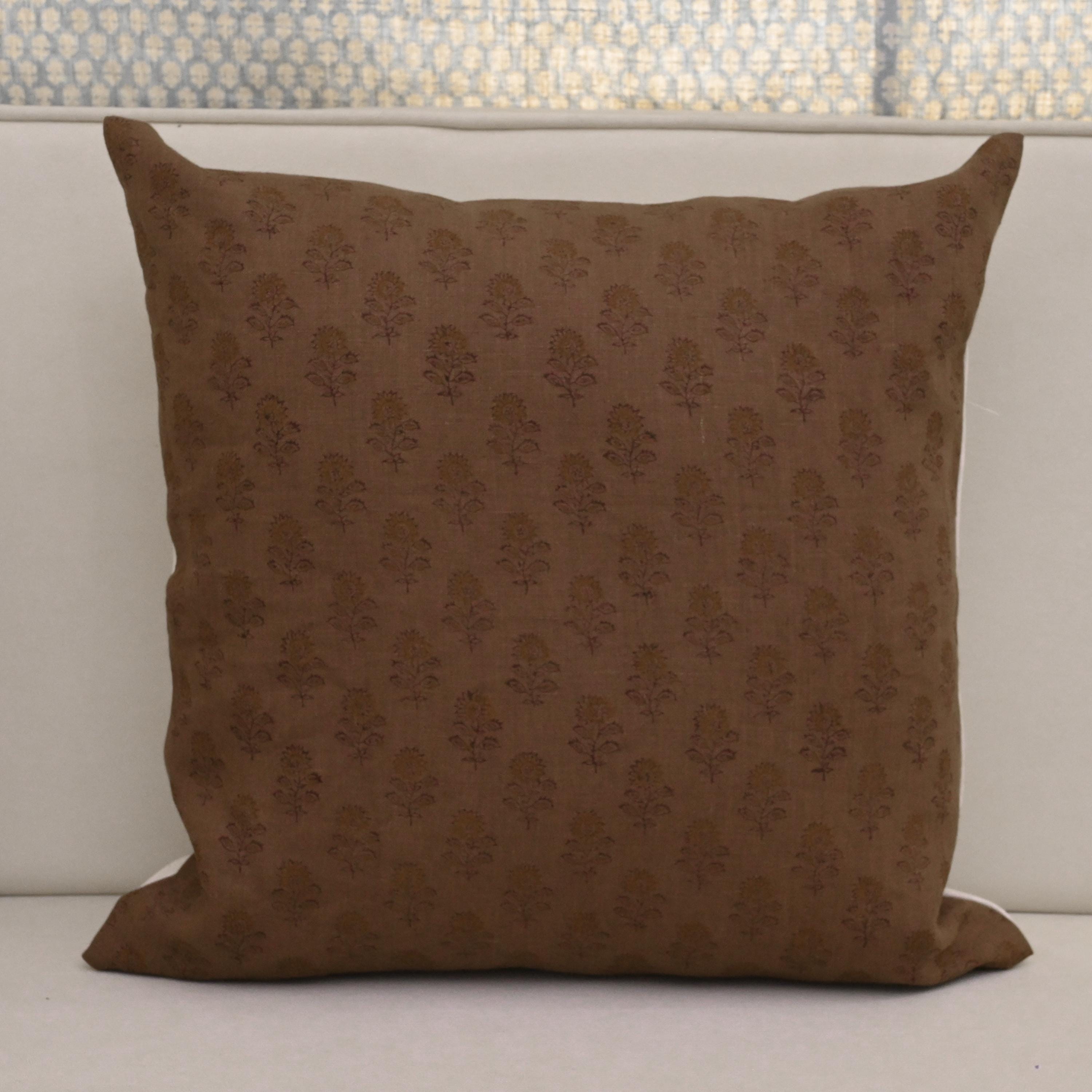 Front view of brown floral buta hand block print cushion cover