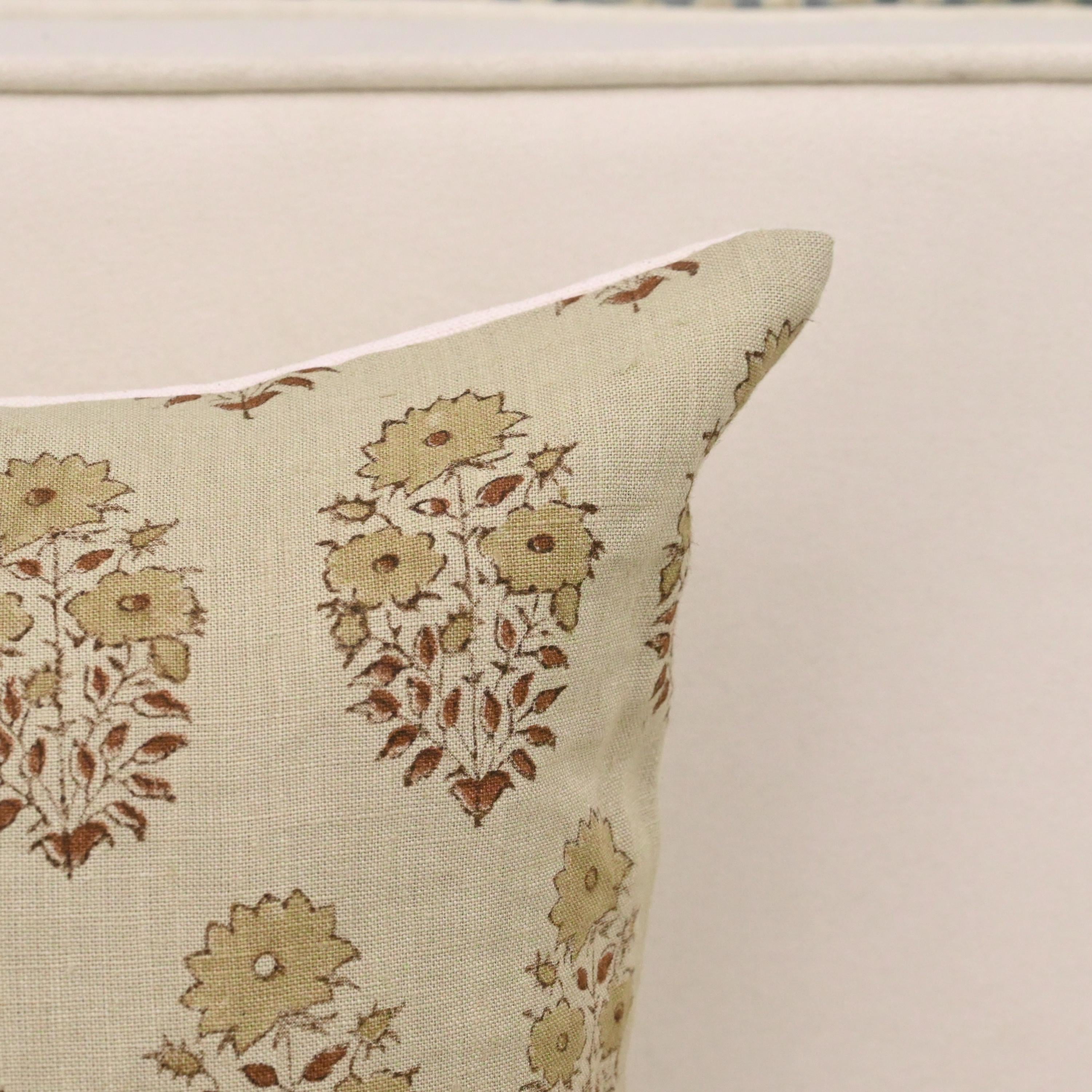 Buta print linen cushion cover styled on a sofa