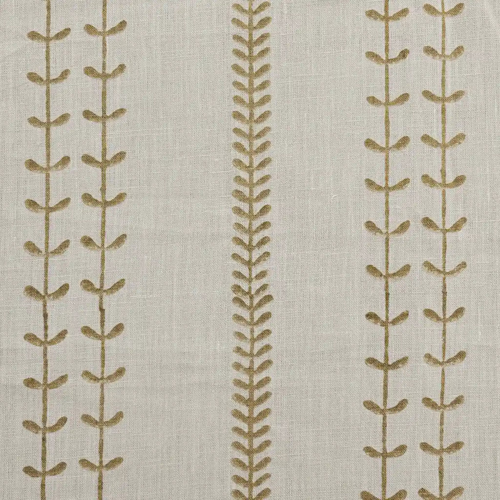 Close-up of hand block printed vine stripe pattern on natural linen fabric
