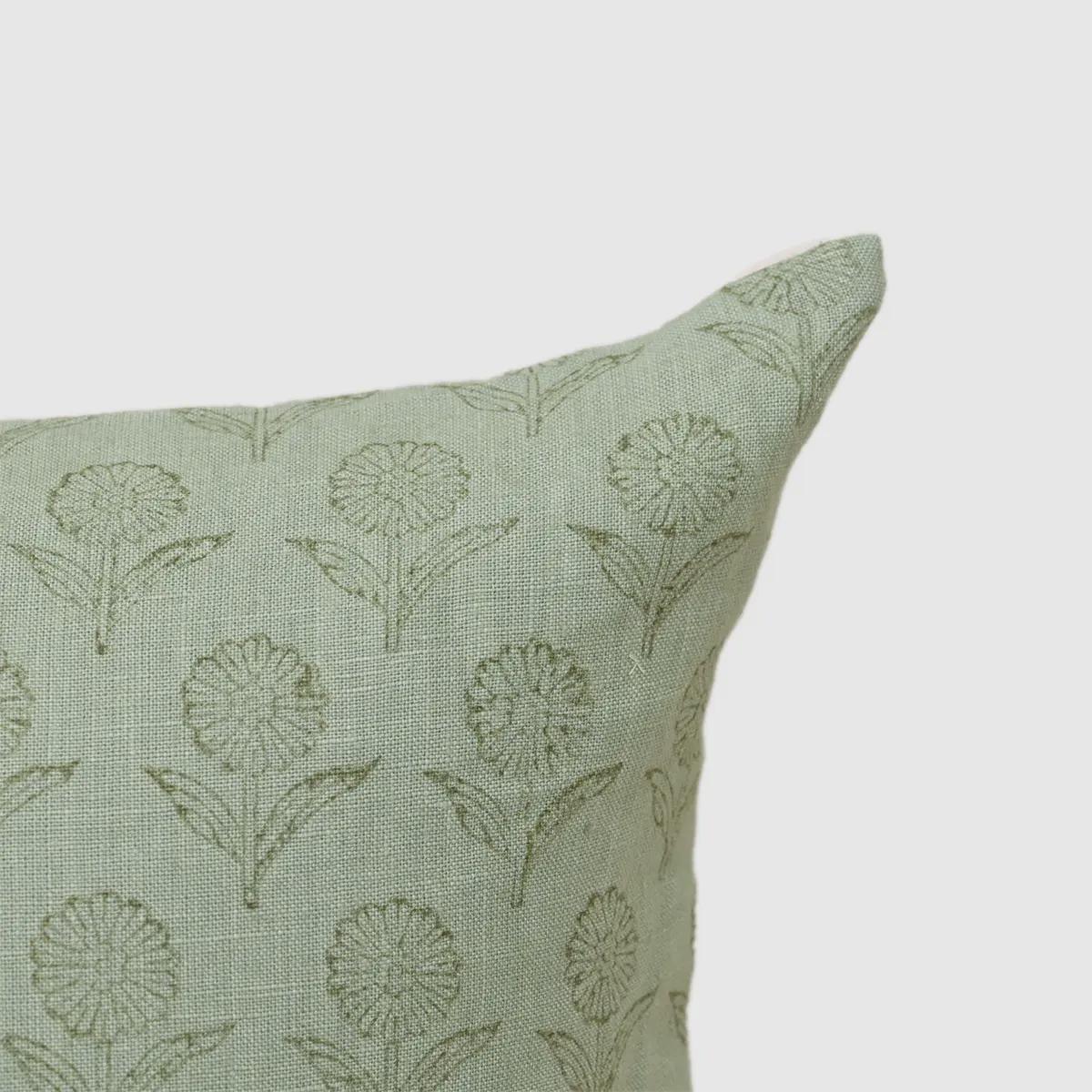 Close-up of tonal floral buti print on sage green linen