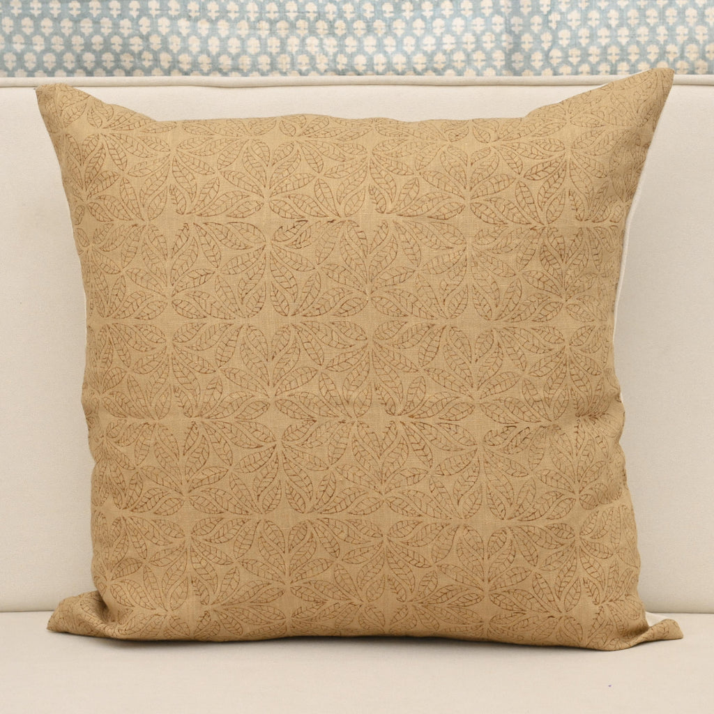 Camel linen pillow cover with hand block printed geometric leaf mandala tile in brown, front view