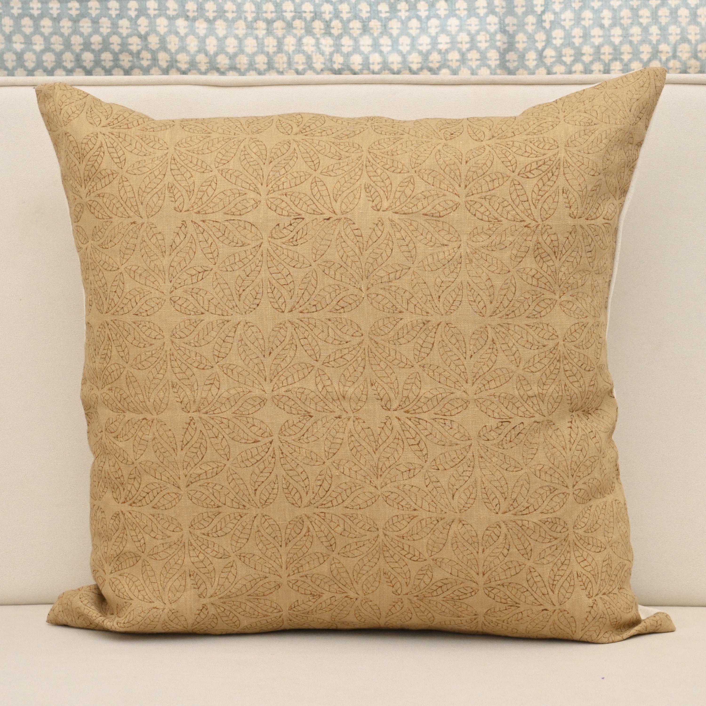 Camel linen pillow cover with hand block printed geometric leaf mandala tile in brown, front view
