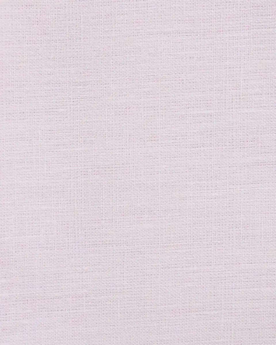 Pink linen pillow cover displayed at an angle showing fabric drape