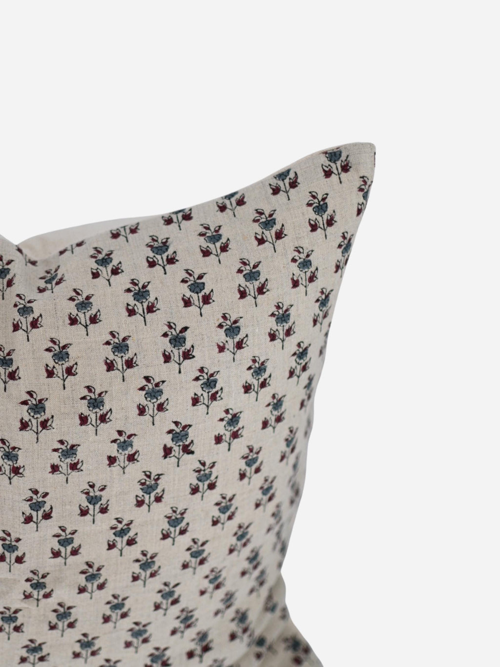 Hand block print linen pillow cover close-up showing floral sprig pattern