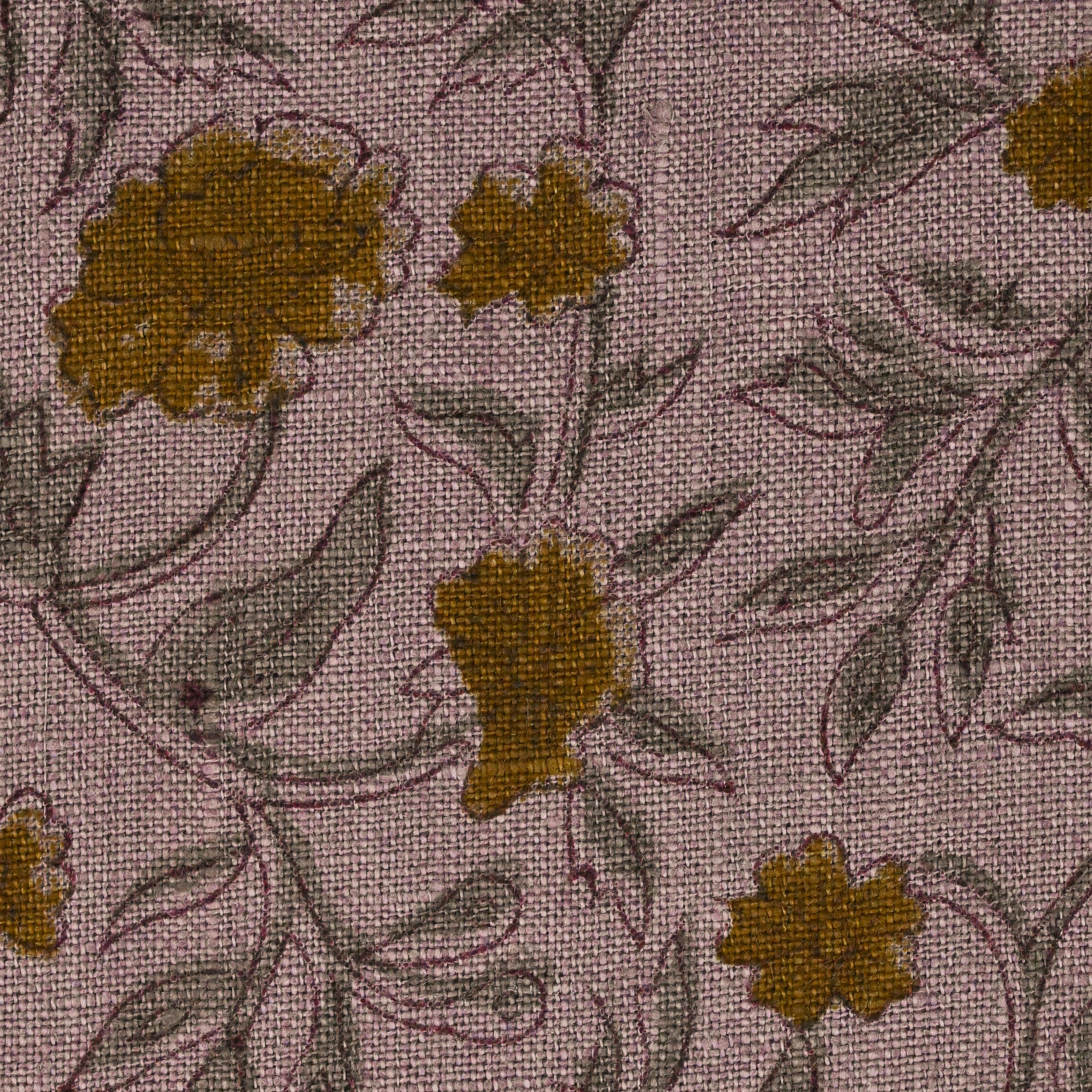 Close-up of the wild rose vine block print detail in charcoal and gold