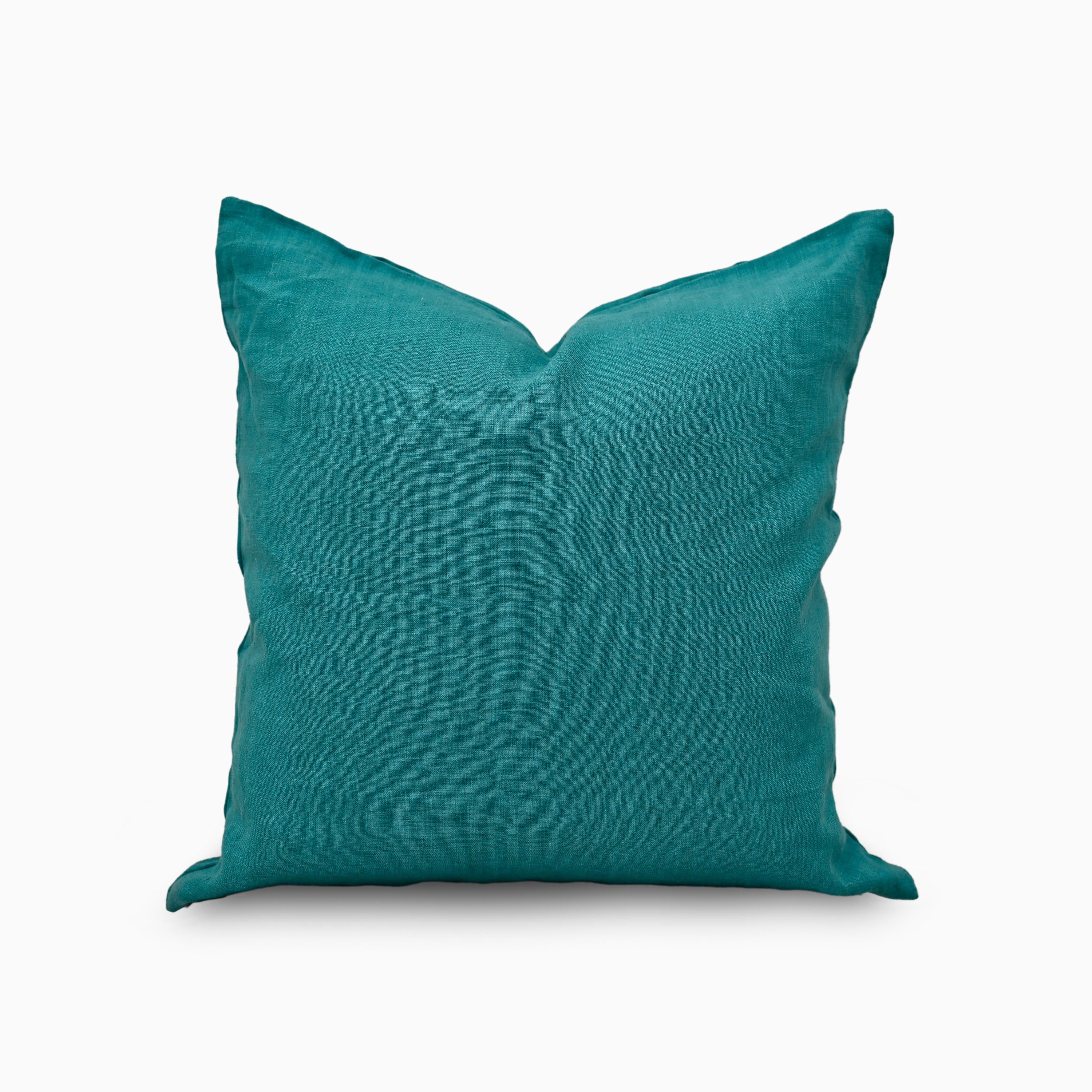 Deep teal solid linen pillow cover, front view on white background