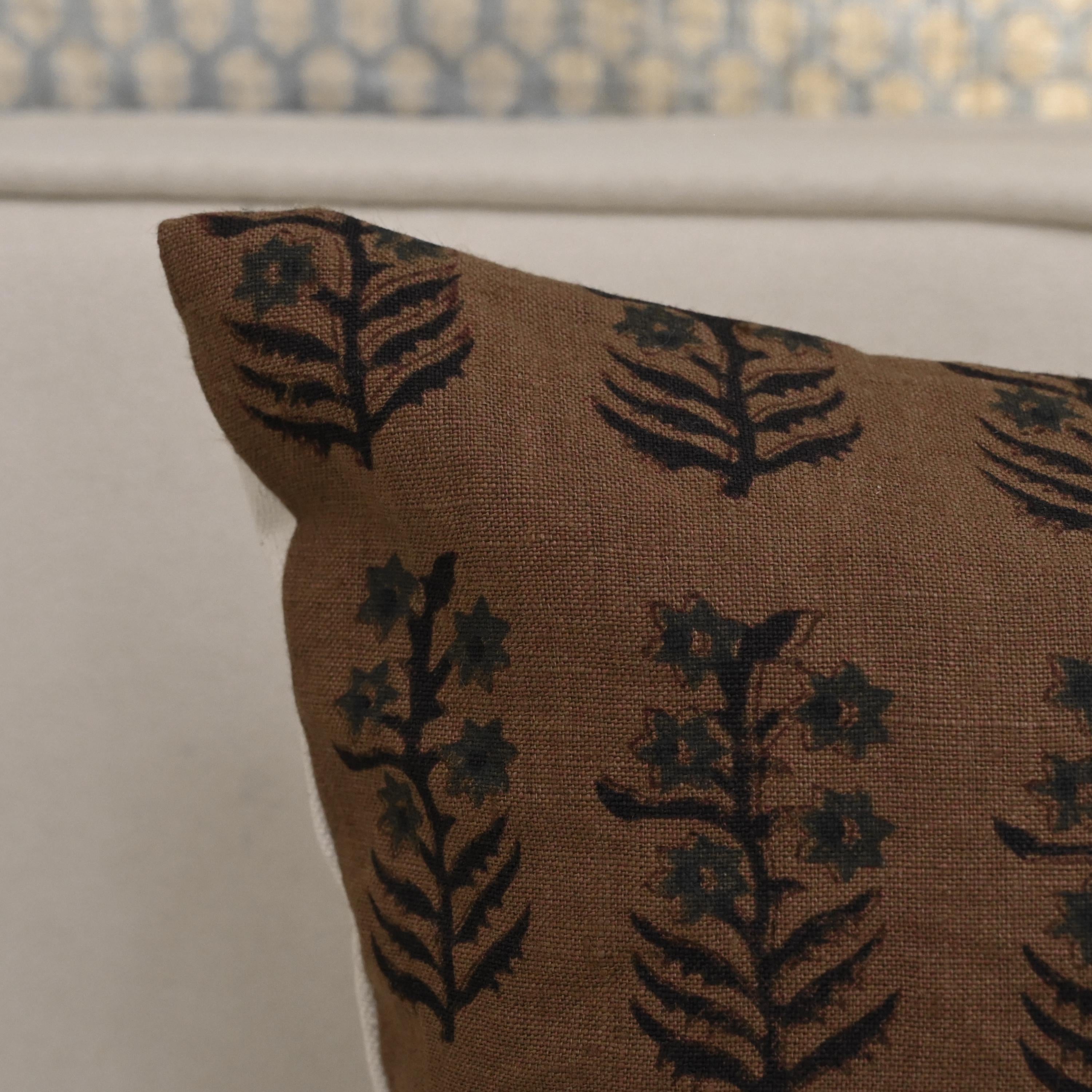 Corner detail of vintage floral booti linen pillow cover