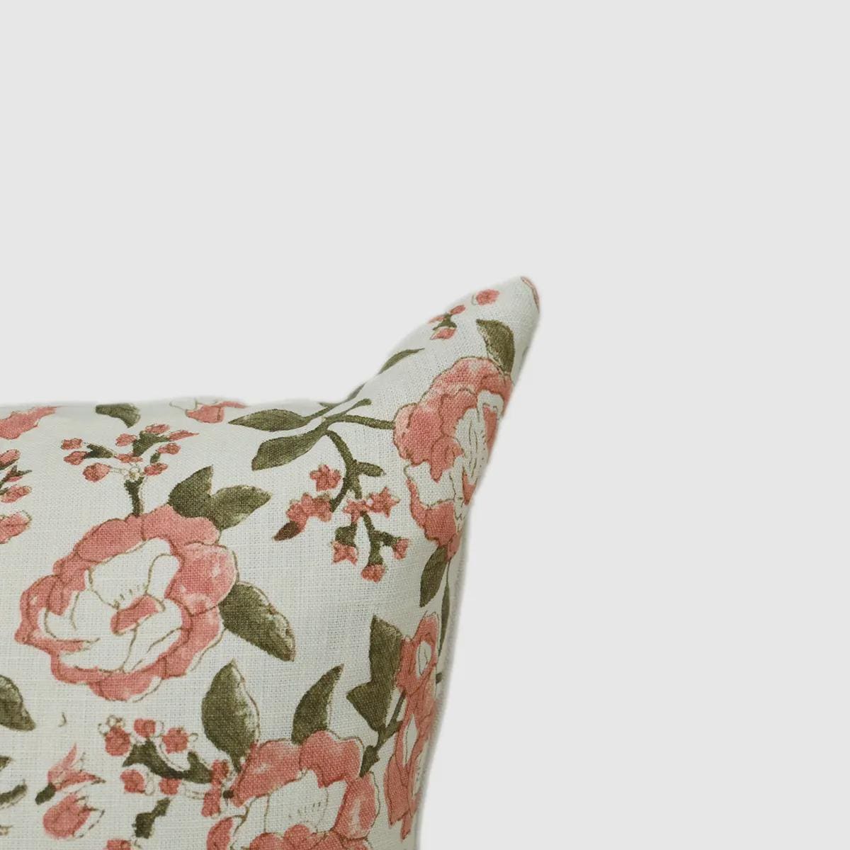 Close-up of blush pink floral print on cream linen