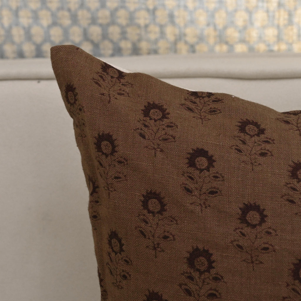 Corner detail of boho floral buti linen pillow cover