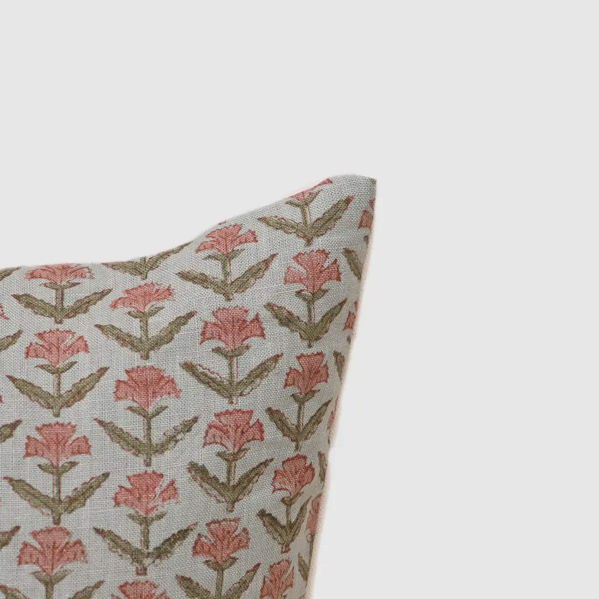 Close-up of rose pink floral buti print on linen