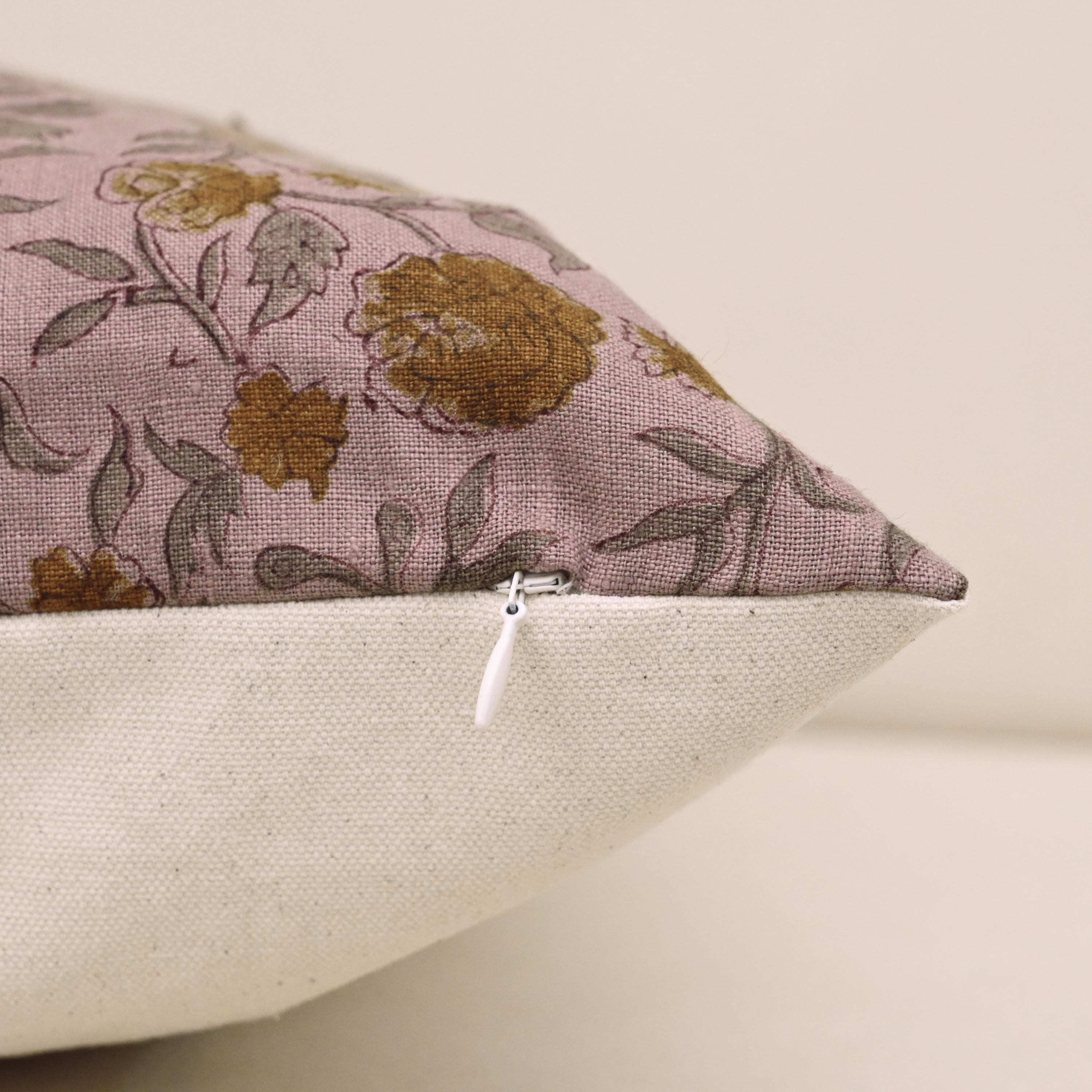 Corner and hidden zipper detail on Rustic carnation linen pillow cover