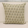 Golden tan floral bouquet hand block print linen pillow cover on natural background