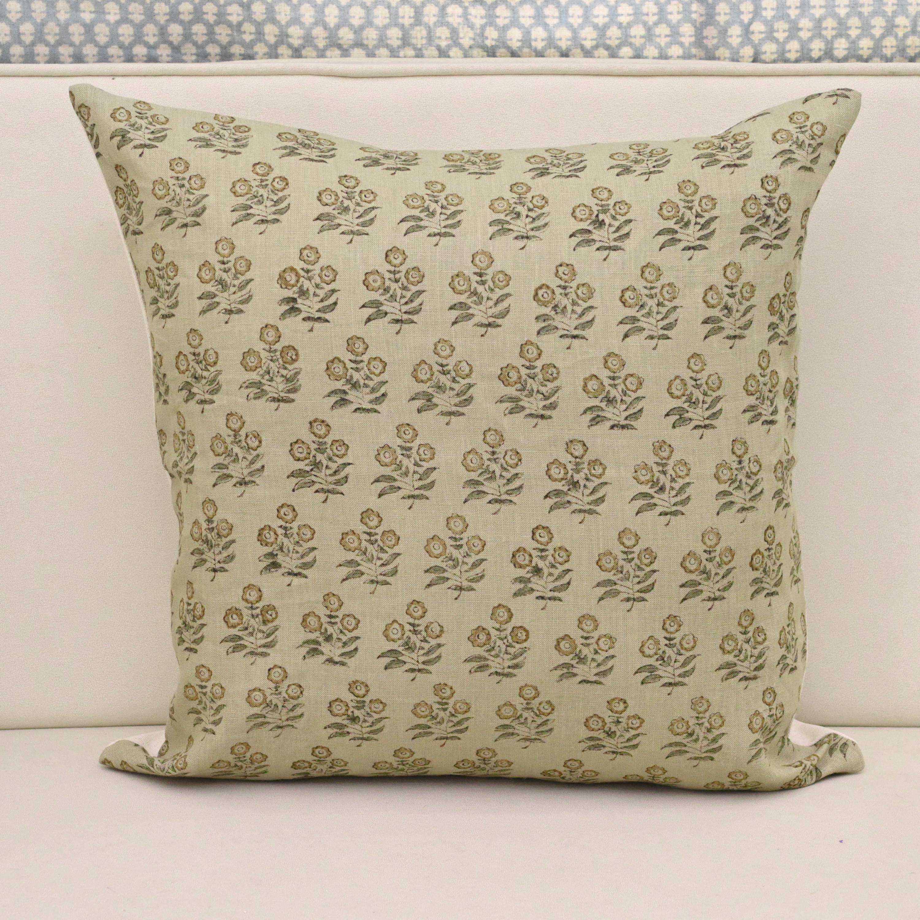 Golden tan floral bouquet hand block print linen pillow cover on natural background
