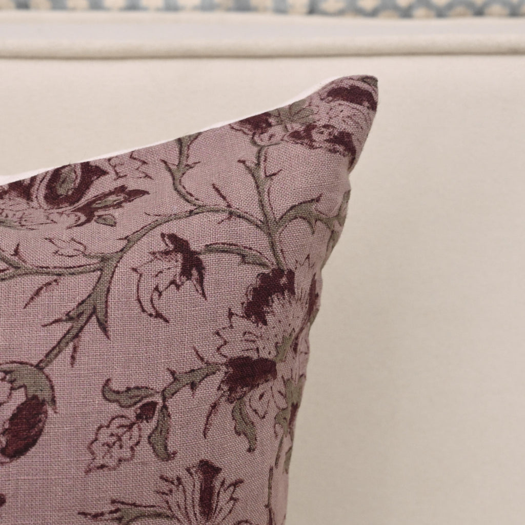 Wine burgundy floral linen pillow cover styled on a sofa