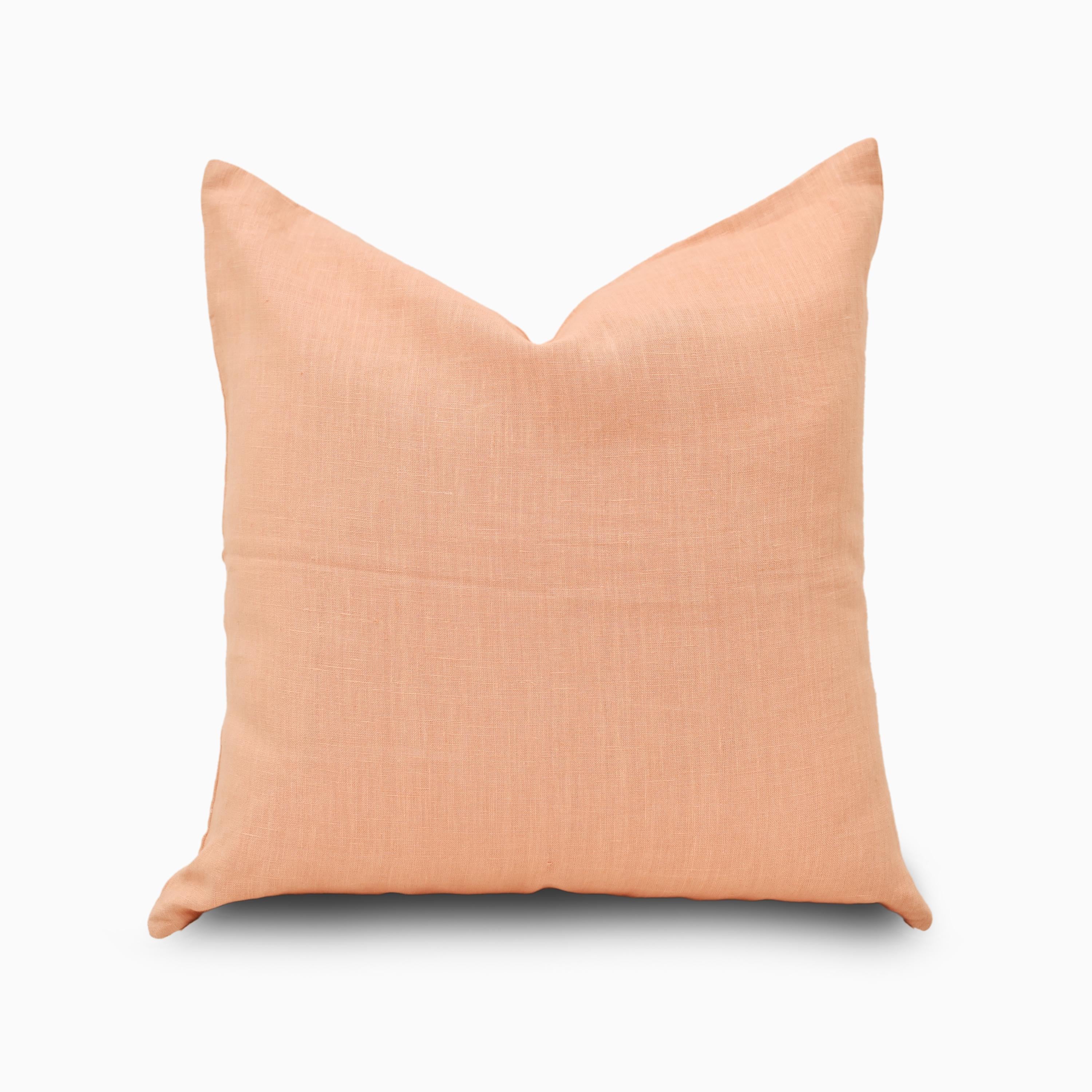 Peach solid linen pillow cover, front view showing soft peach tone