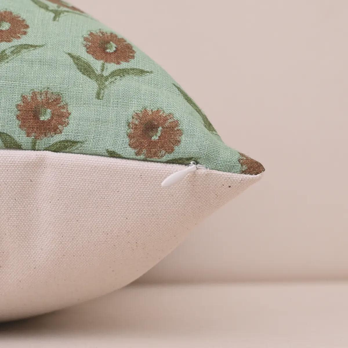 Sage green floral linen pillow cover corner and zipper detail
