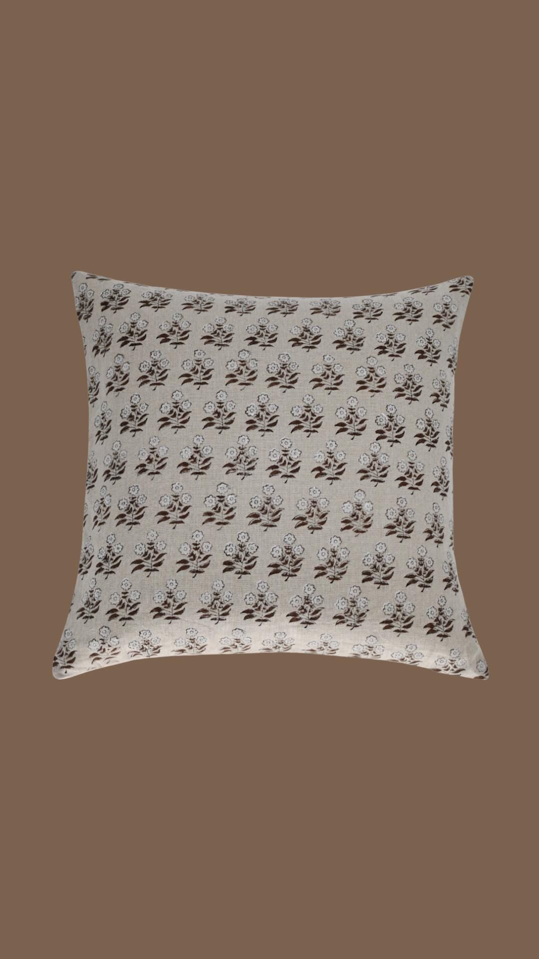Close-up of the brown ditsy floral hand block print on natural linen