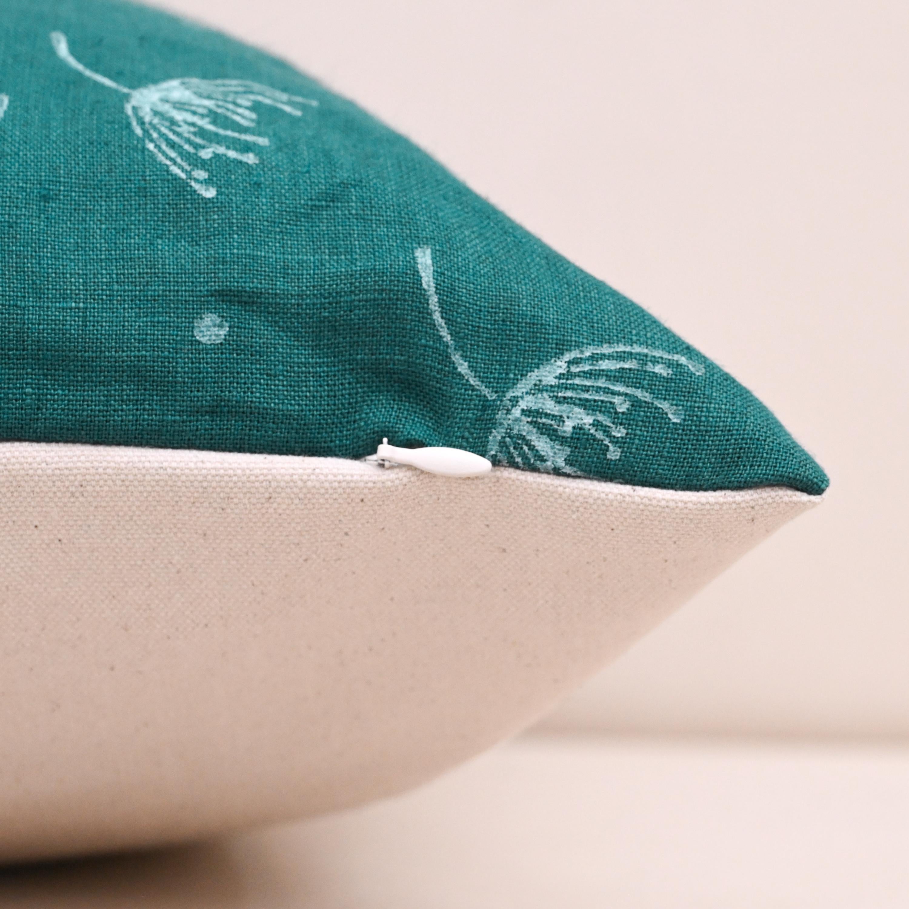 Hidden zipper closure on teal wild meadow sprigs cushion cover