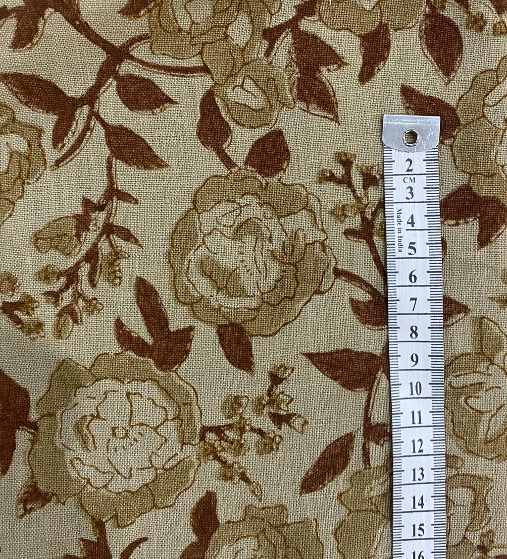 Sage rust hand block print linen pillow cover styled in a living room