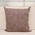 Dusty mauve linen pillow cover with hand block printed floral vine in charcoal grey and khaki gold, front view