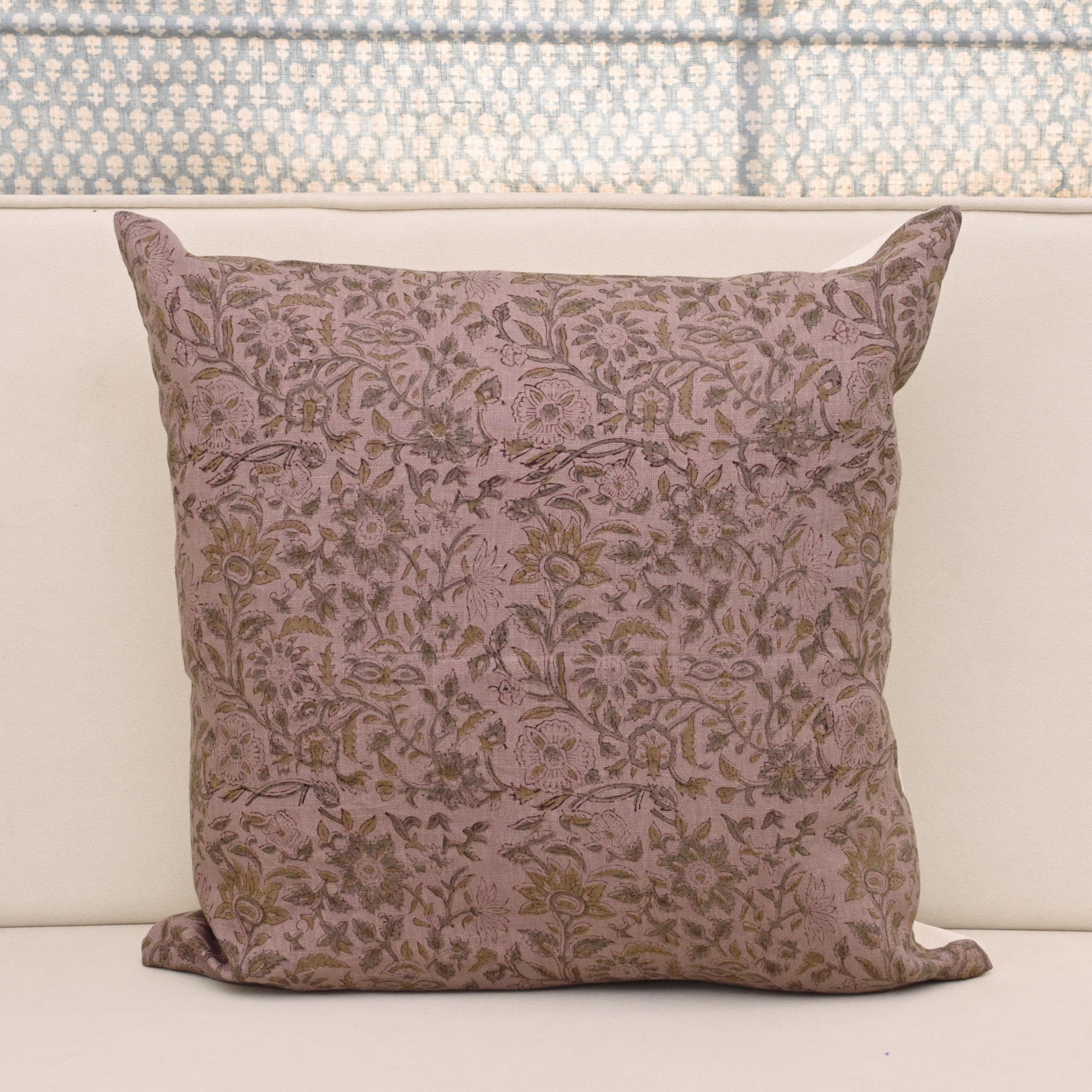 Dusty mauve linen pillow cover with hand block printed floral vine in charcoal grey and khaki gold, front view