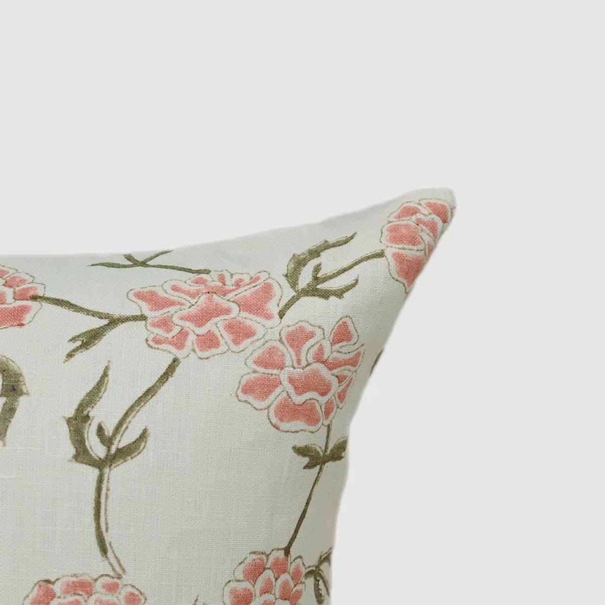 Close-up of blush pink floral vine print on ivory linen