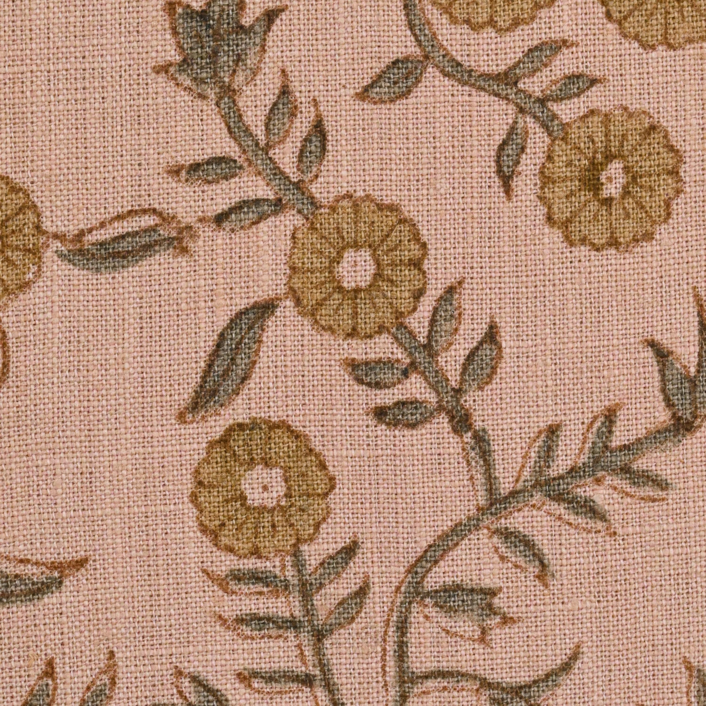 Close-up of the coral floral hand block print on linen fabric