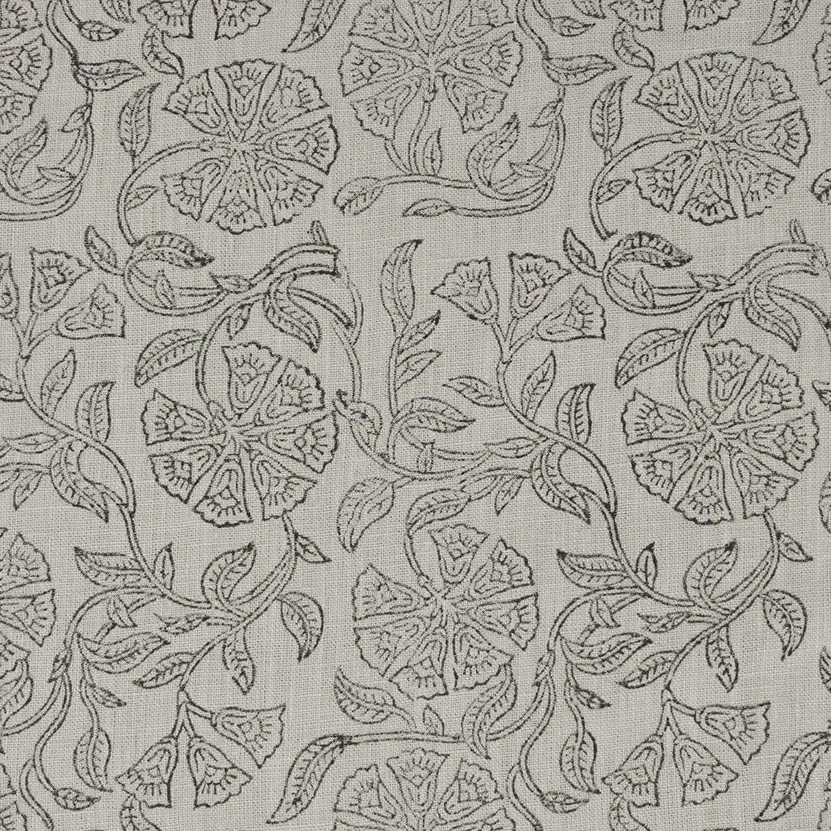 Close-up of ashen grey floral block print detail on cream linen pillow cover