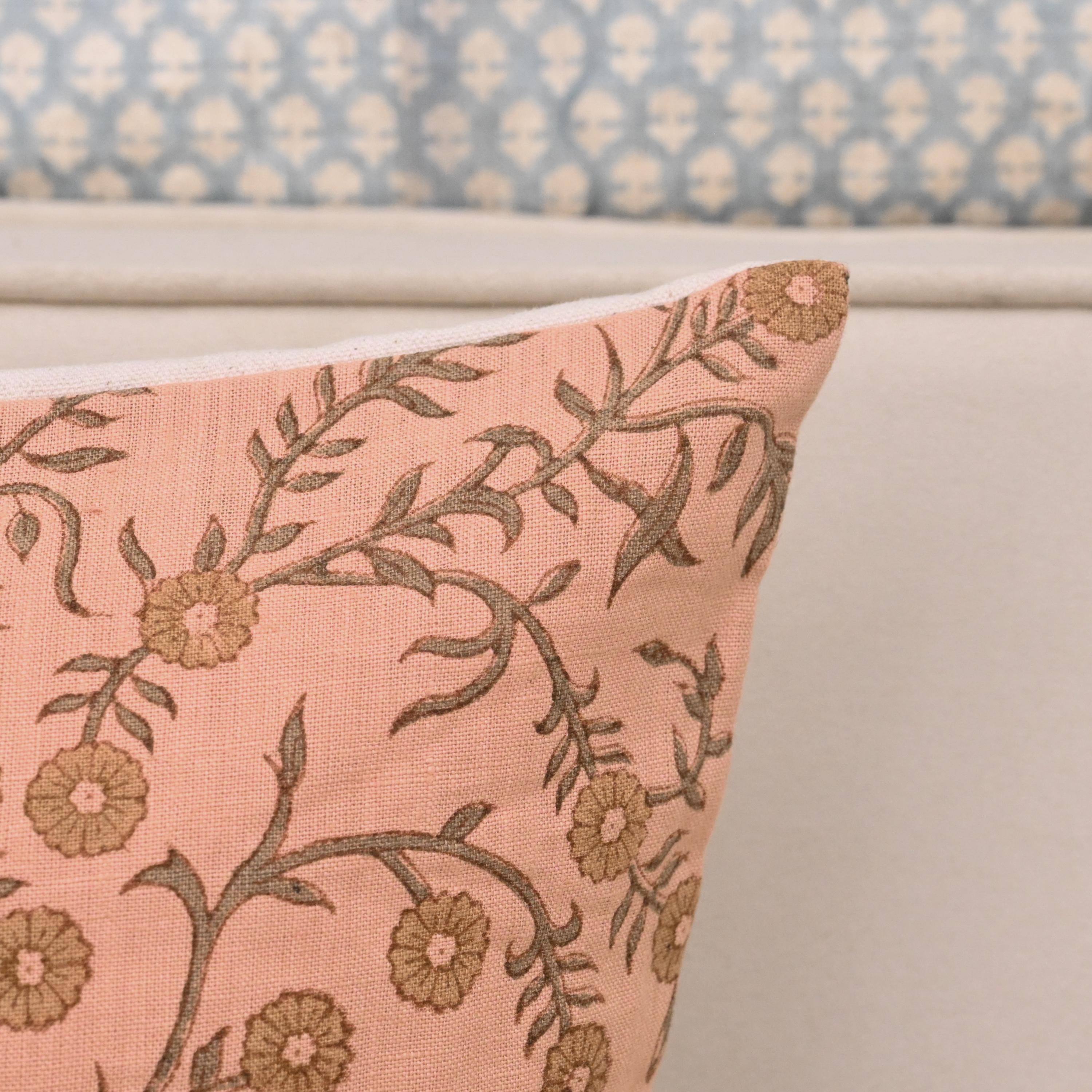 Coral floral linen pillow cover, corner and hidden zipper detail
