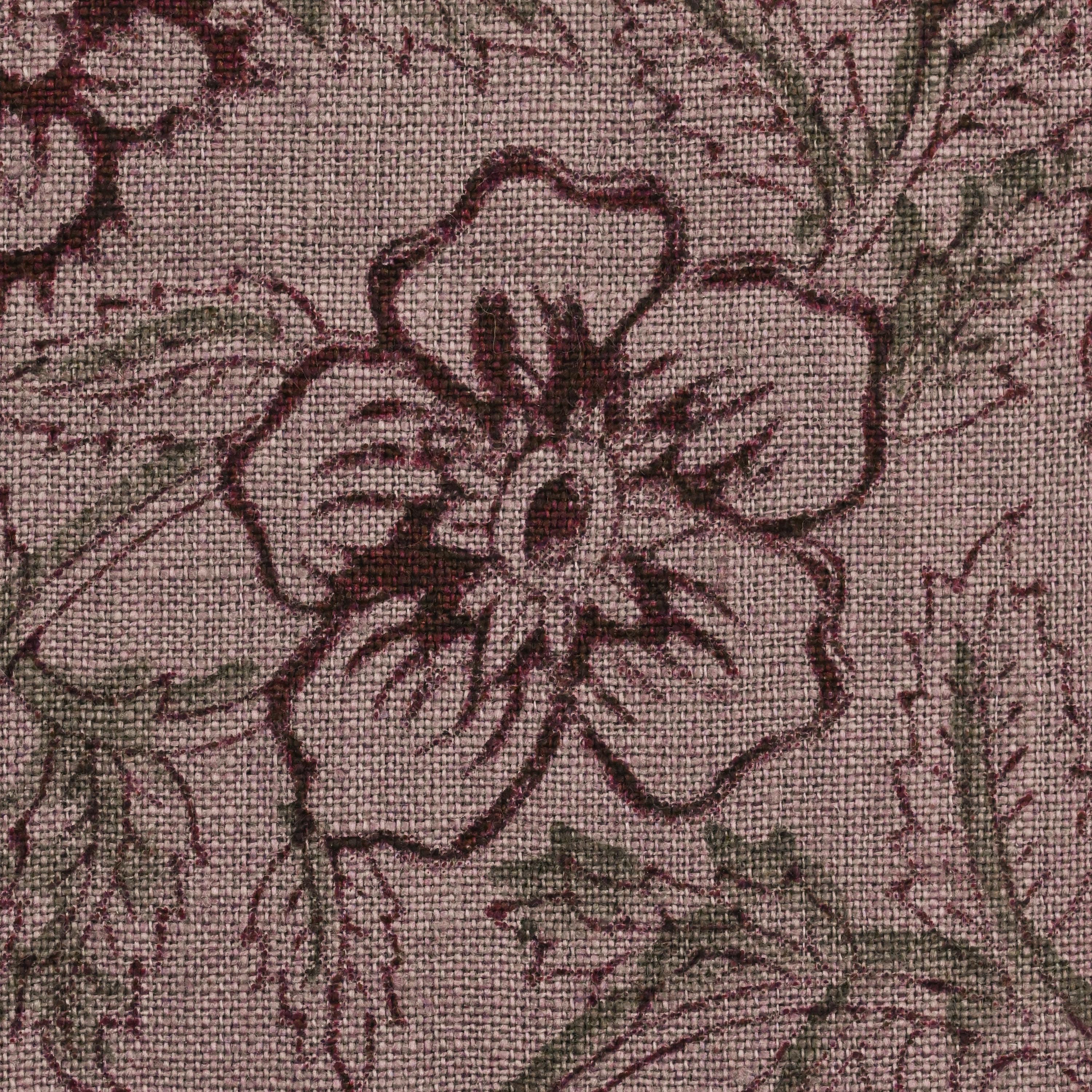 Hidden zipper and corner detail of mauve floral linen throw pillow cover