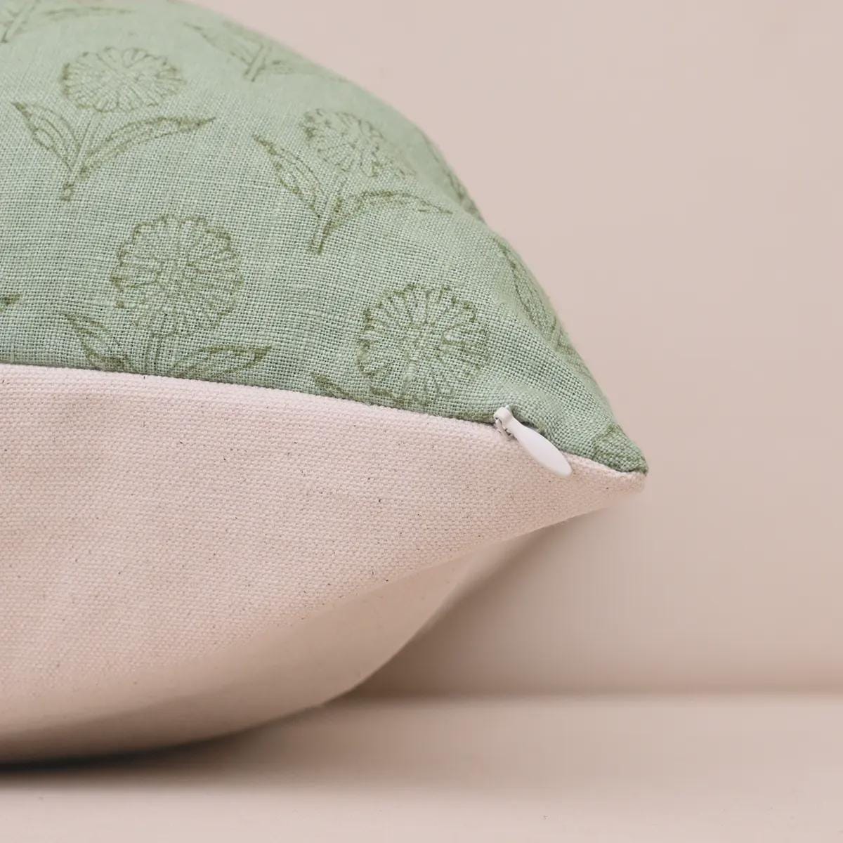Sage green floral linen pillow cover corner and zipper detail