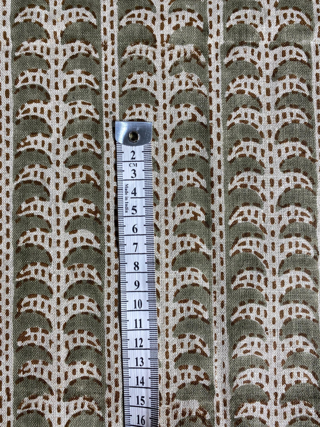 Tan scalloped stripe linen pillow cover, fabric texture close-up