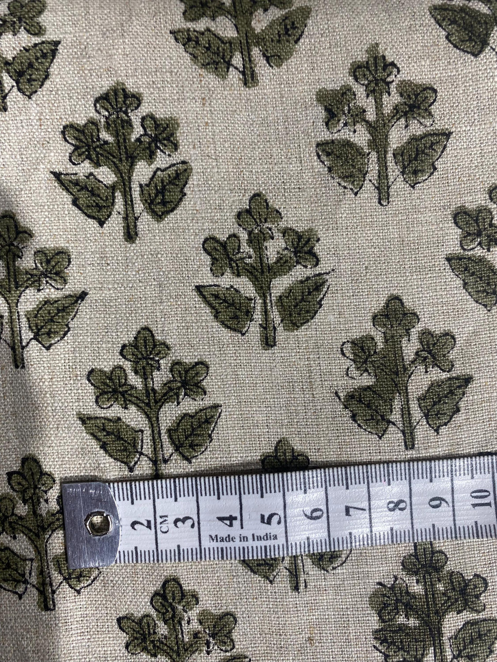 Olive green sprig linen pillow cover, back view