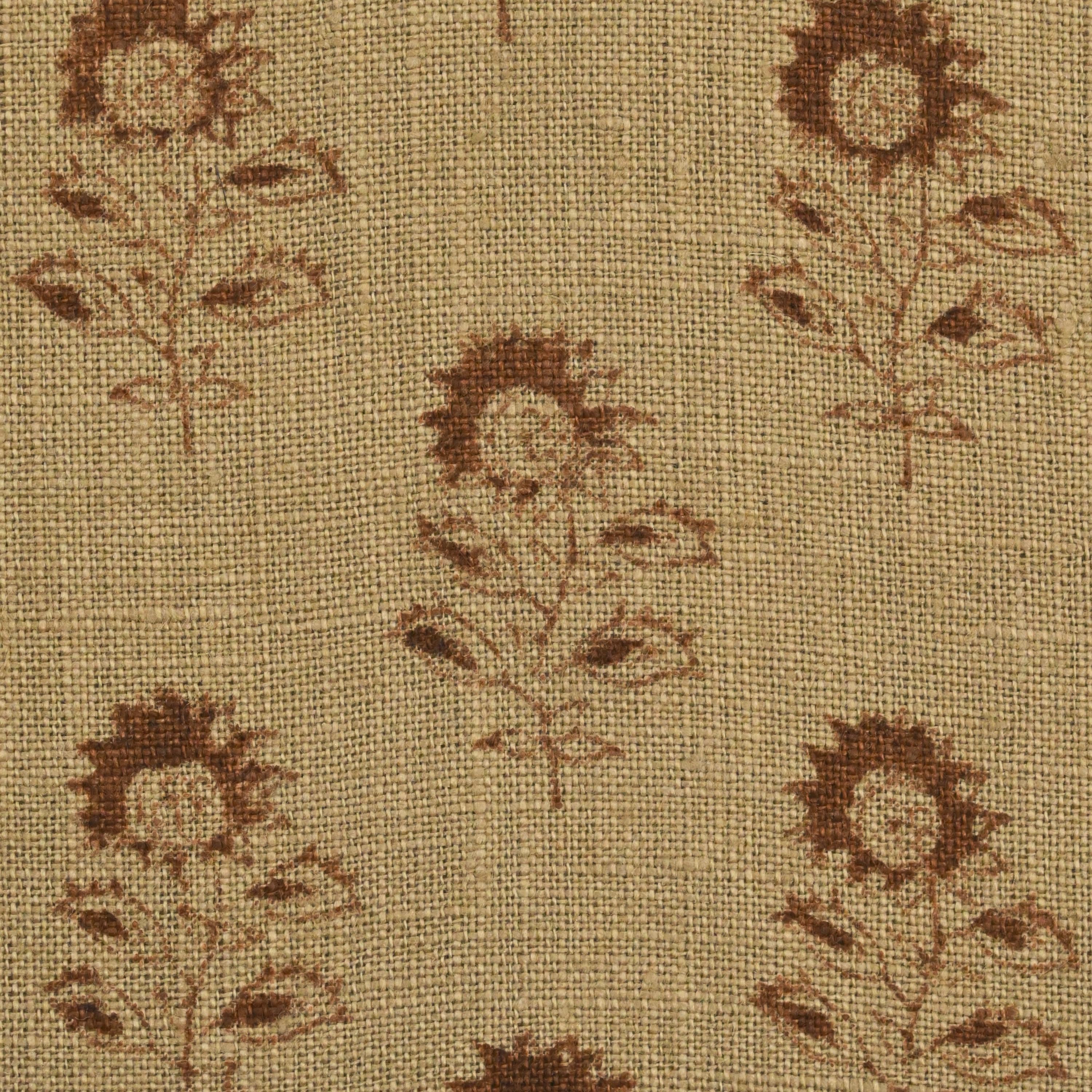 Indira sunflower buti linen pillow cover styled on a sofa