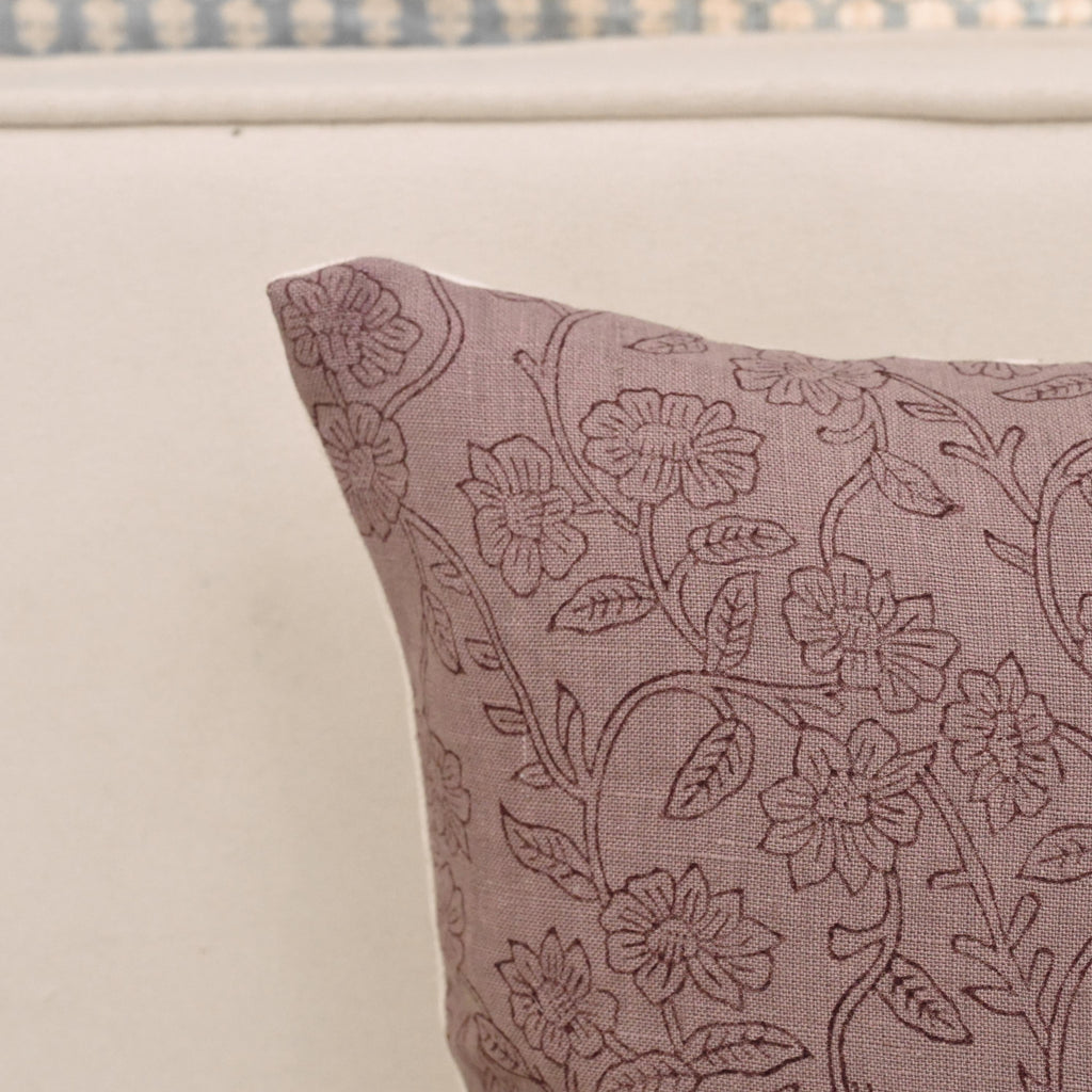 Haven ditsy floral linen pillow cover styled on a sofa