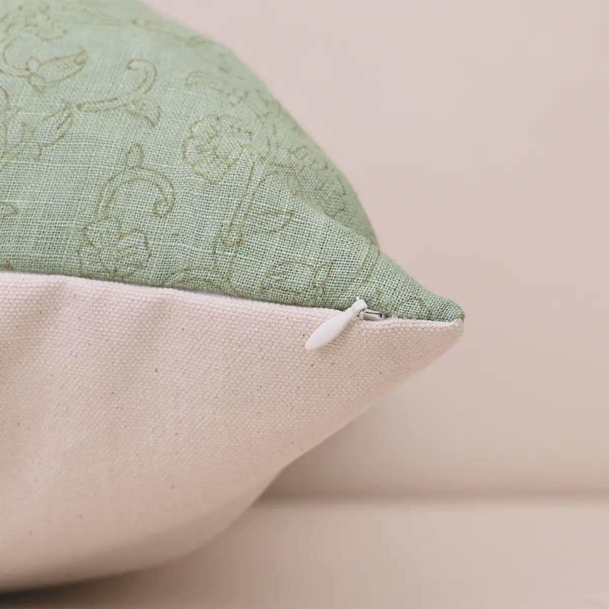 Sage green botanical linen pillow cover corner and zipper detail