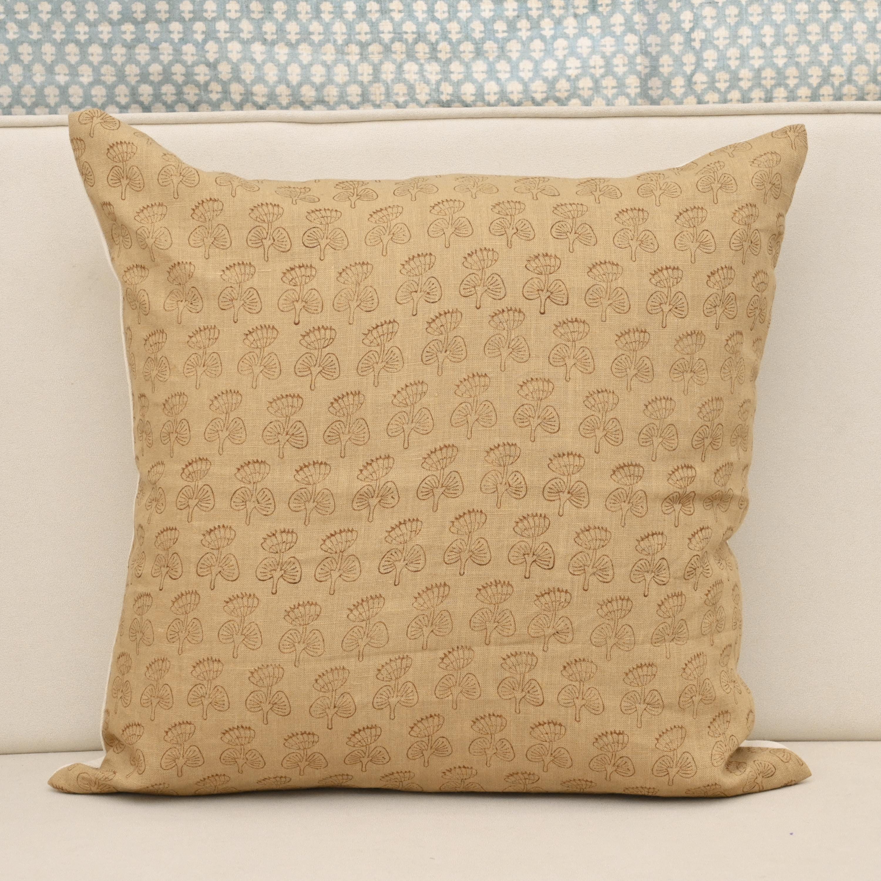 Camel linen pillow cover with hand block printed tawny brown geometric leaf motif, front view