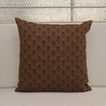 Boho floral buti block print linen pillow cover leaning against a headboard