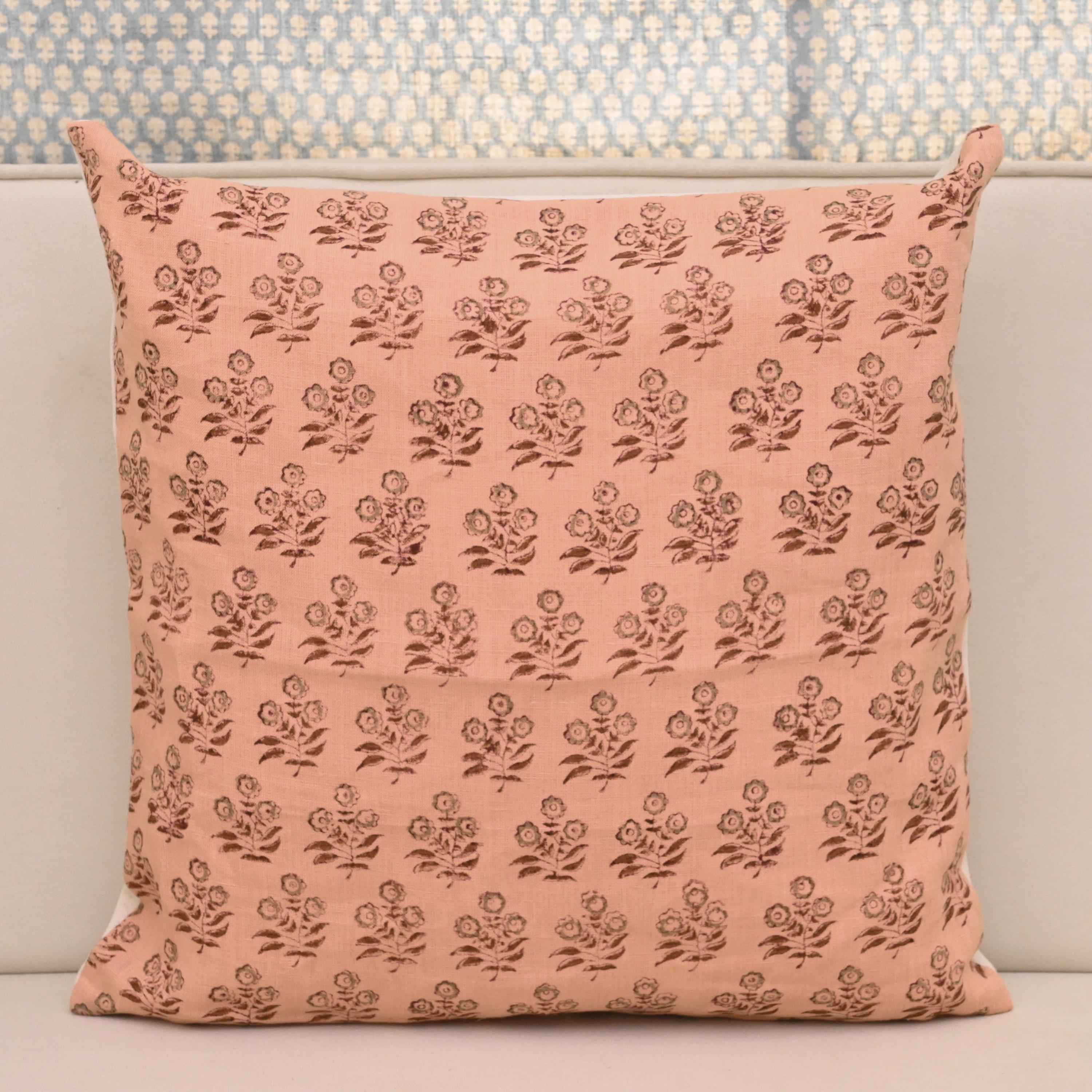 Peach blush linen cushion cover with hand block printed chestnut brown floral buti, front view