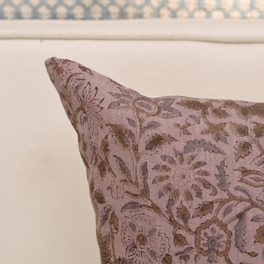 Close-up of the wild rose vine block print detail in charcoal and khaki gold