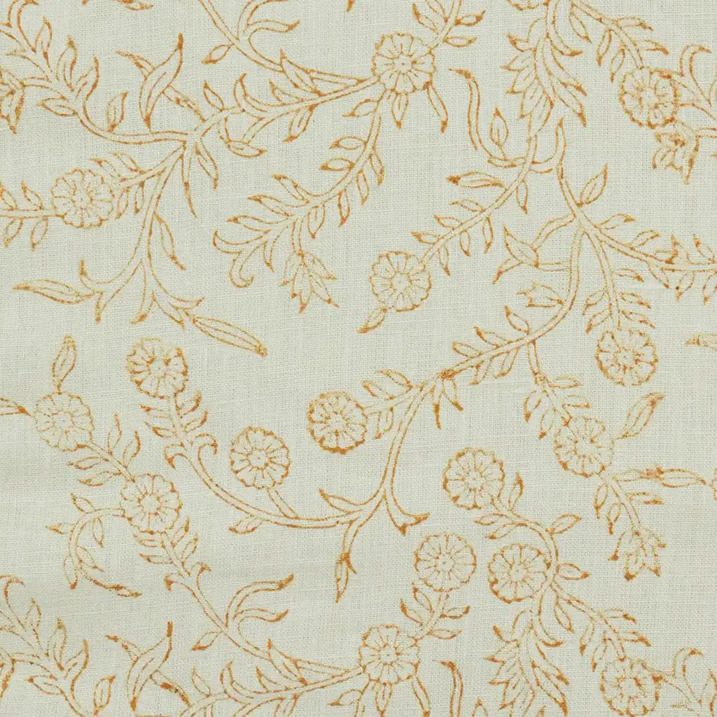 Ivory floral block print linen pillow cover styled on a sofa
