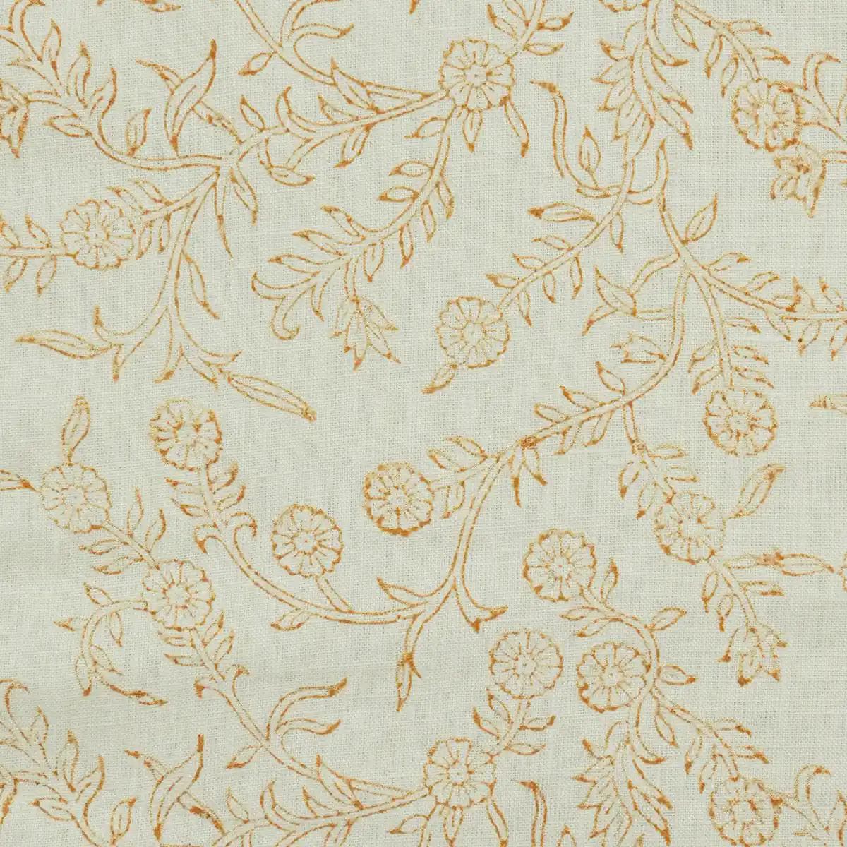 Ivory floral block print linen pillow cover styled on a sofa