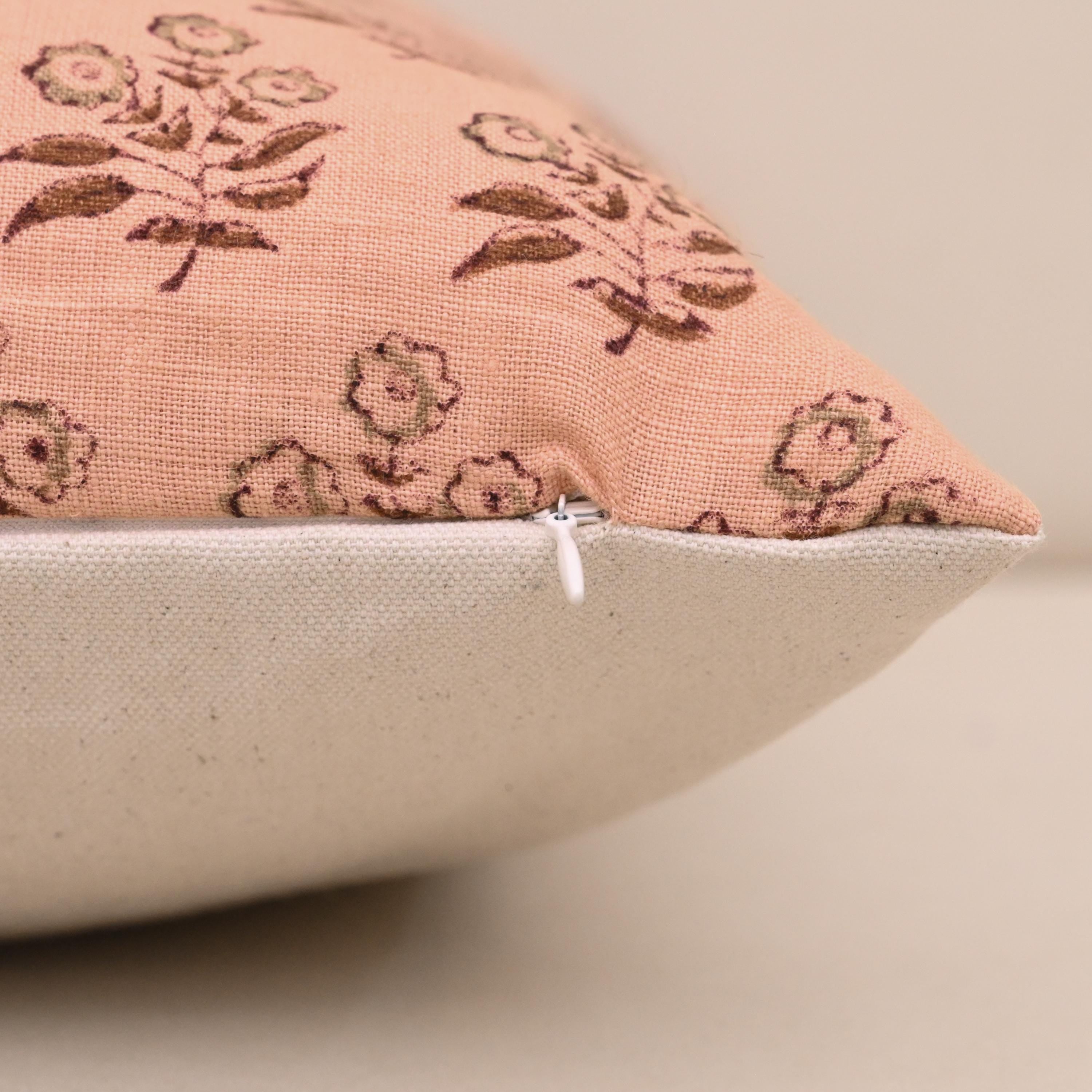 Corner and hidden zipper detail on Willow peach linen cushion cover